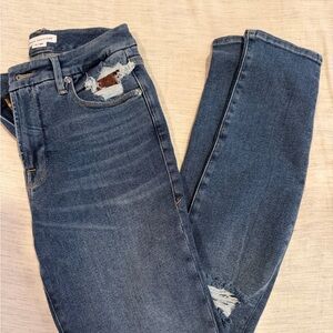 Good American “Good Legs” distressed skinny jeans